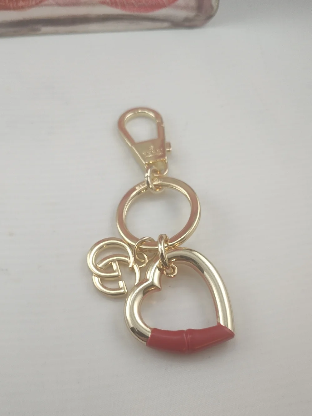 Authentic Gucci Bagcharm Rosso Ancora red enamel Retail $799